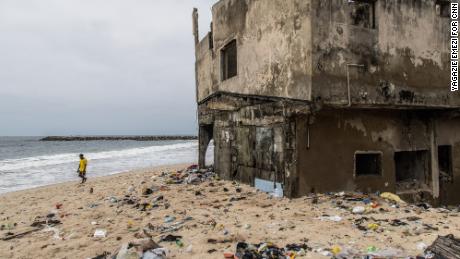 While countries wrangle over who should pay for the climate crisis, a community on Lagos Island is being swallowed by the sea 
